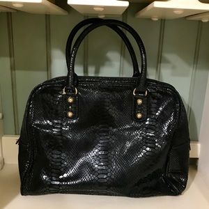 Michael Kors black snakeskin satchel.